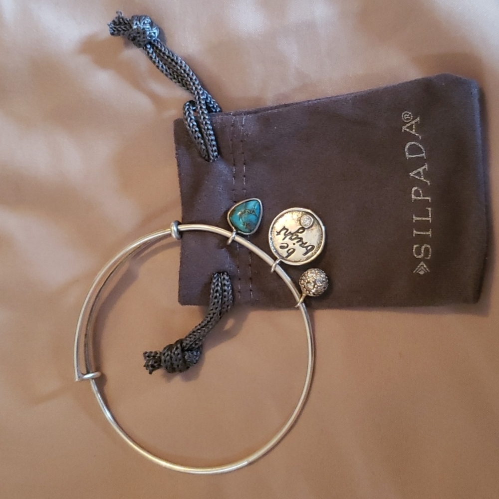 Silpada Sterling Silver bracelet with charms.